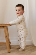 Barboteuse en coton biologique à imprimé marin, motif voilier et phare, avec fermeture éclair intégrale pour habiller facilement les bébés de 0 à 3 ans