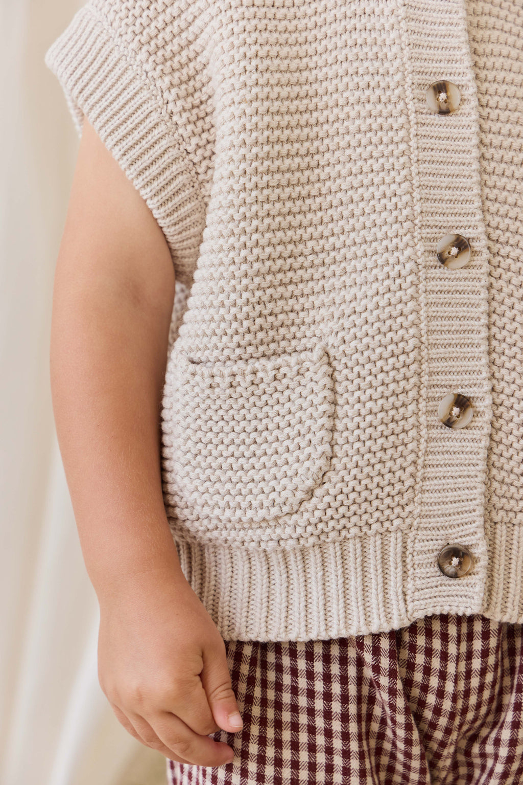 Gilet en tricot de coton uni avec fermeture boutonnée et poche pour enfants de 0 à 8 ans