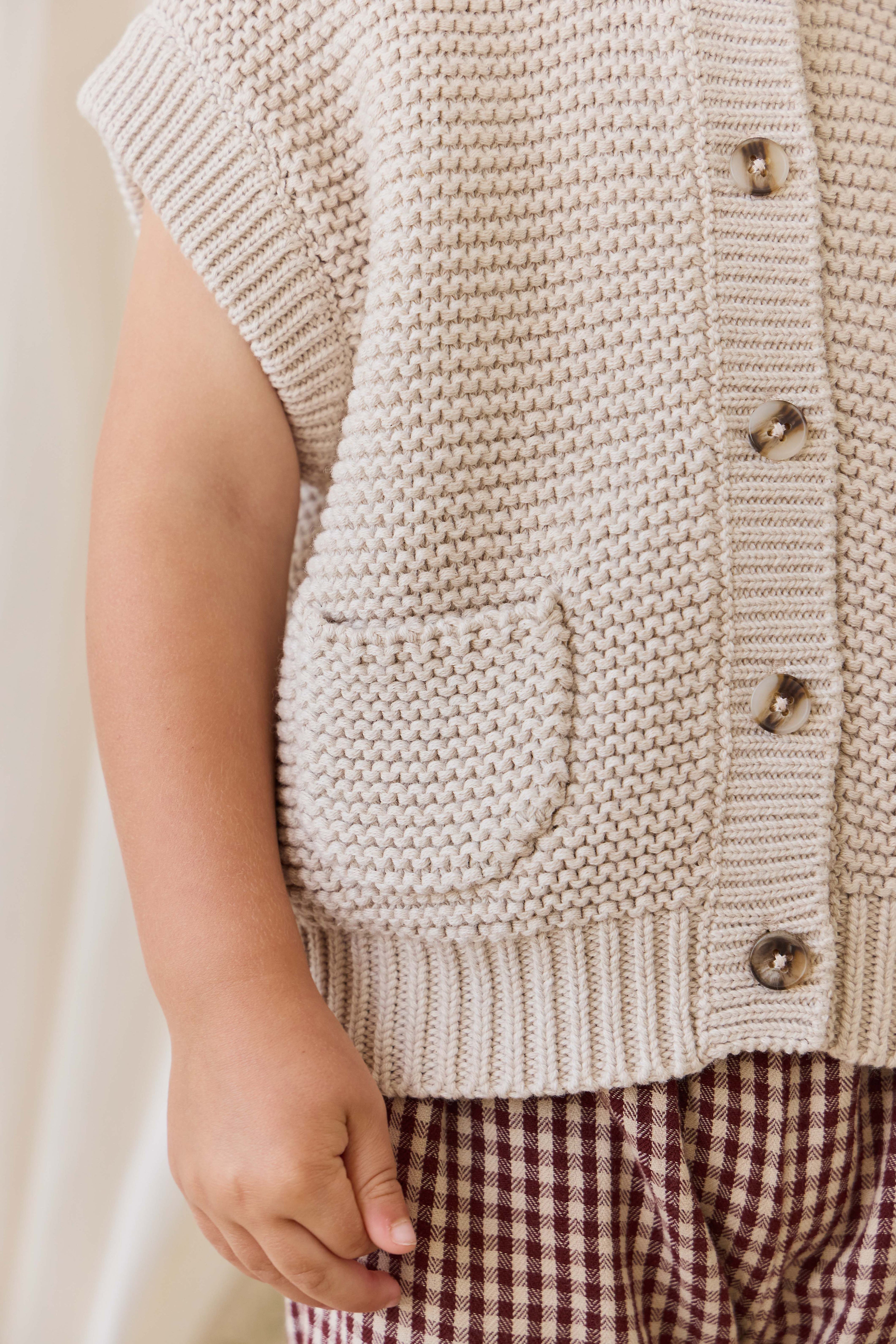 Gilet en tricot de coton uni avec fermeture boutonnée et poche pour enfants de 0 à 8 ans