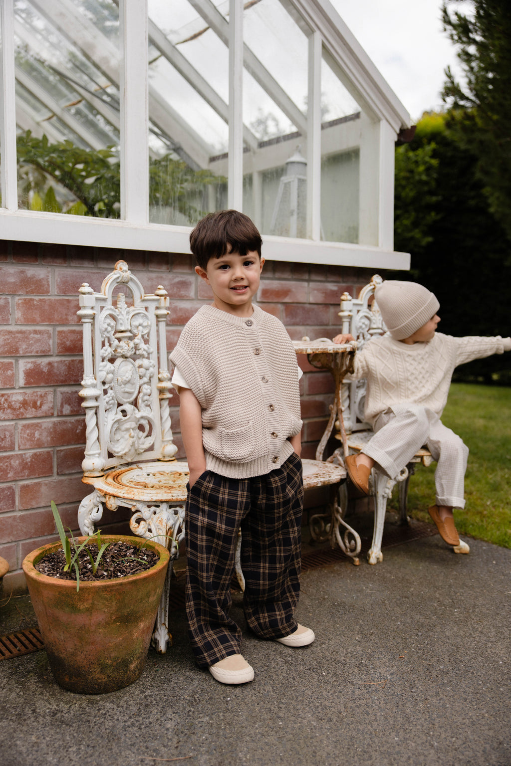 Gilet en tricot de coton uni avec fermeture boutonnée et poche pour enfants de 0 à 8 ans