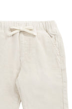Pantalon décontracté en coton uni coloris avoine avec taille élastiquée et accessoires sans nickel pour enfants de 6 mois à 8 ans