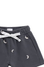 Short en coton biologique avec imprimé croissant de lune islandais, taille élastique et extensibilité douce pour enfants de 6 mois à 8 ans