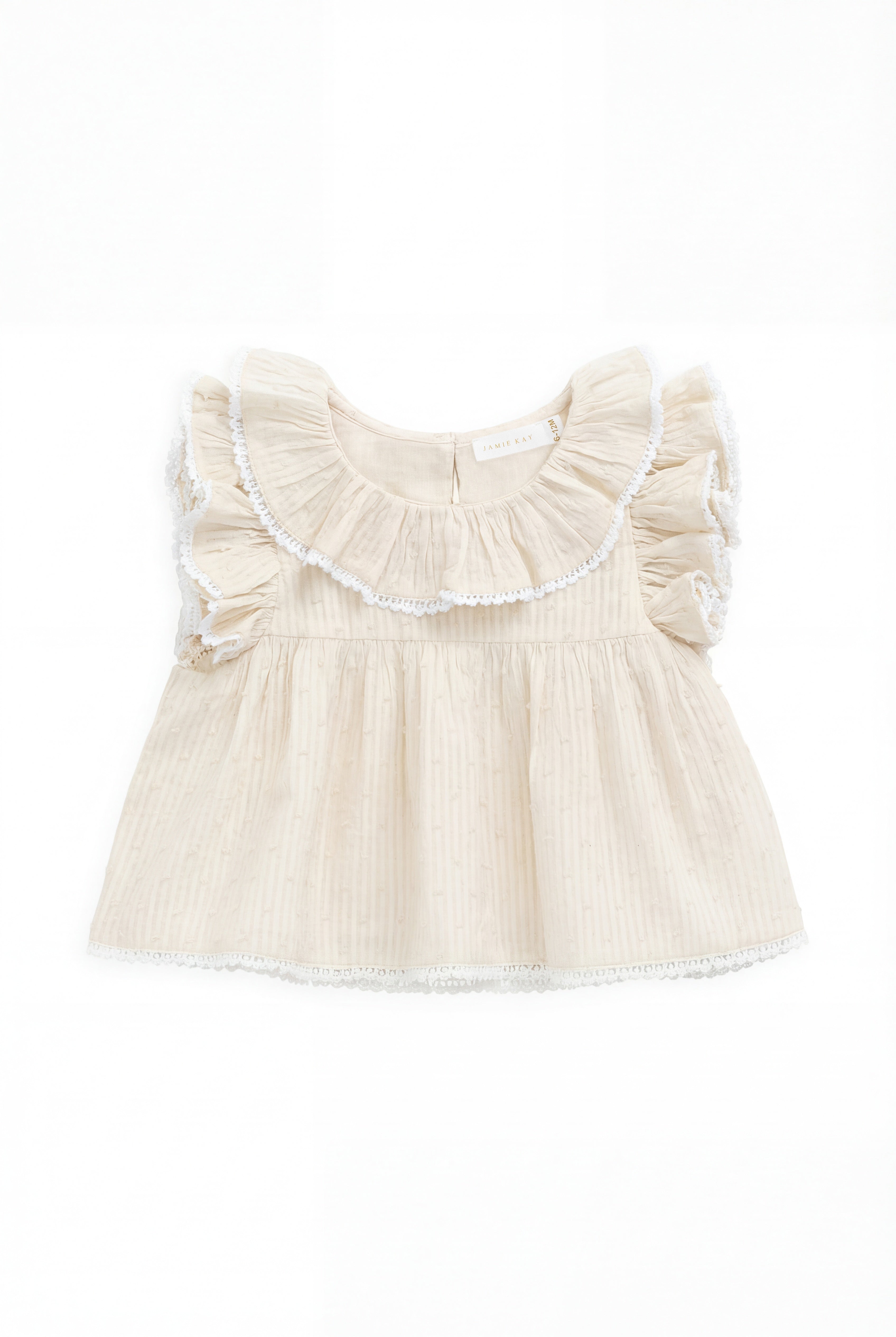 Chemisier délicat en coton biologique couleur parchemin, avec manches volantées et col à volants pour filles de 0 à 10 ans